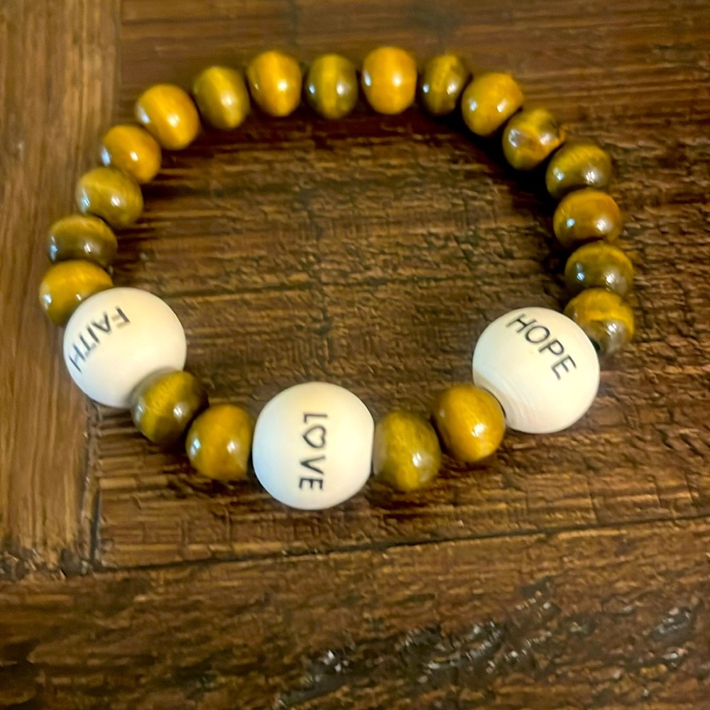 Very cute natural beads love, blessing, and faith or you could have hope love.